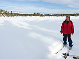 Cross country skier on the groomed trail in the Rainbow Mountains.